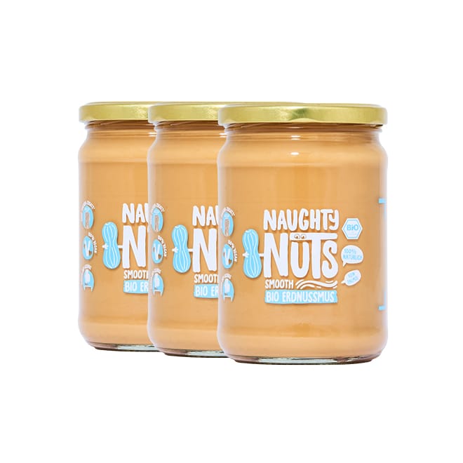 Drei Gläser Bio Erdnussmus Smooth 500g mit goldenen Deckeln und Naughty Nuts Etikett